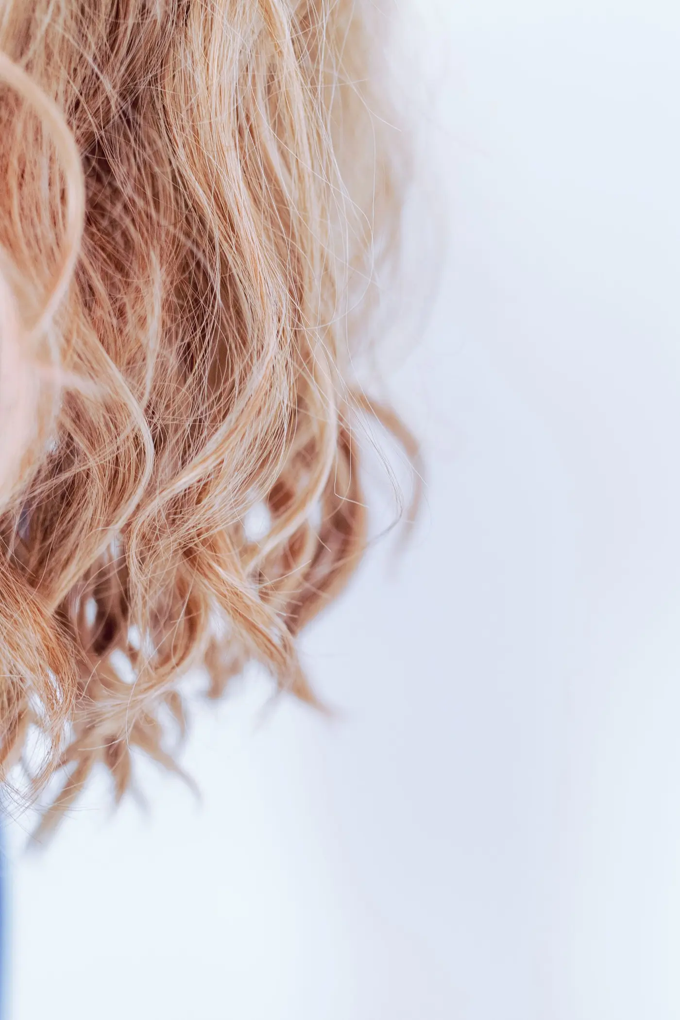 Close-up of softly waved blonde hair